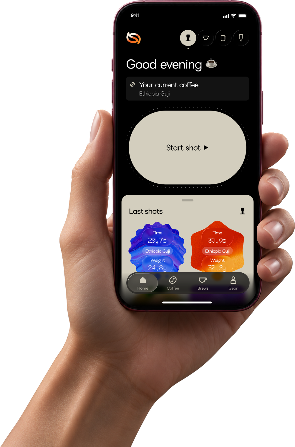 A hand holding a phone that shows the Shot home screen.